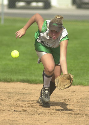 Celina's Kelli Williams charges hard to catch the ball in the air for an out just before it hits the ground during Division II district semifinals action at Bath High School against the Wildkittens. Bath scored one run in the game but it was enough to knock off Celina, 1-0 in 10 innnings.<br>dailystandard.com