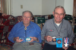 Left, Ray Wenning displays medals Battle of the Bulge veterans received during a trip to Europe.<br>Right, Elmer Dorsten has a purple heart with three cluster from serving at the Battle of the Bulge, the bloodiest land battle of World War II. <br>dailystandard.com
