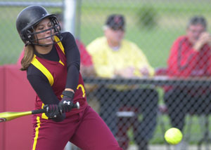 New Bremen's Jennifer Dick laces a single for the Cardinals during Division IV sectional final action on Tuesday. New Bremen defeated Fort Recovery, 1-0.<br></br>dailystandard.com